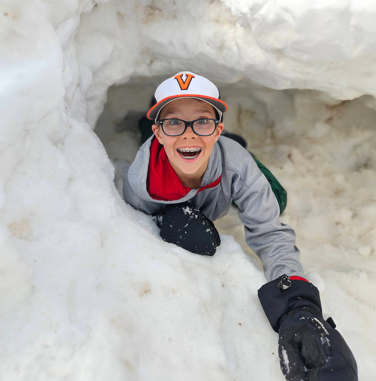 A Discover Term student playing in the snow