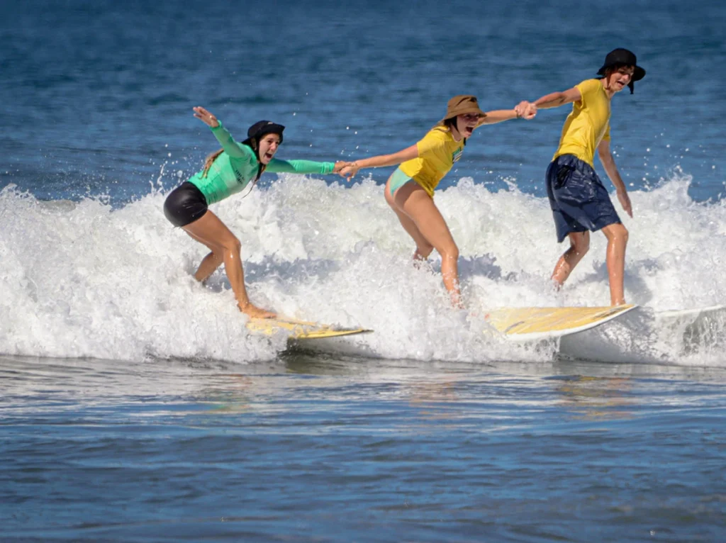 Surf and Service high school students on a beach in Costa Rica.