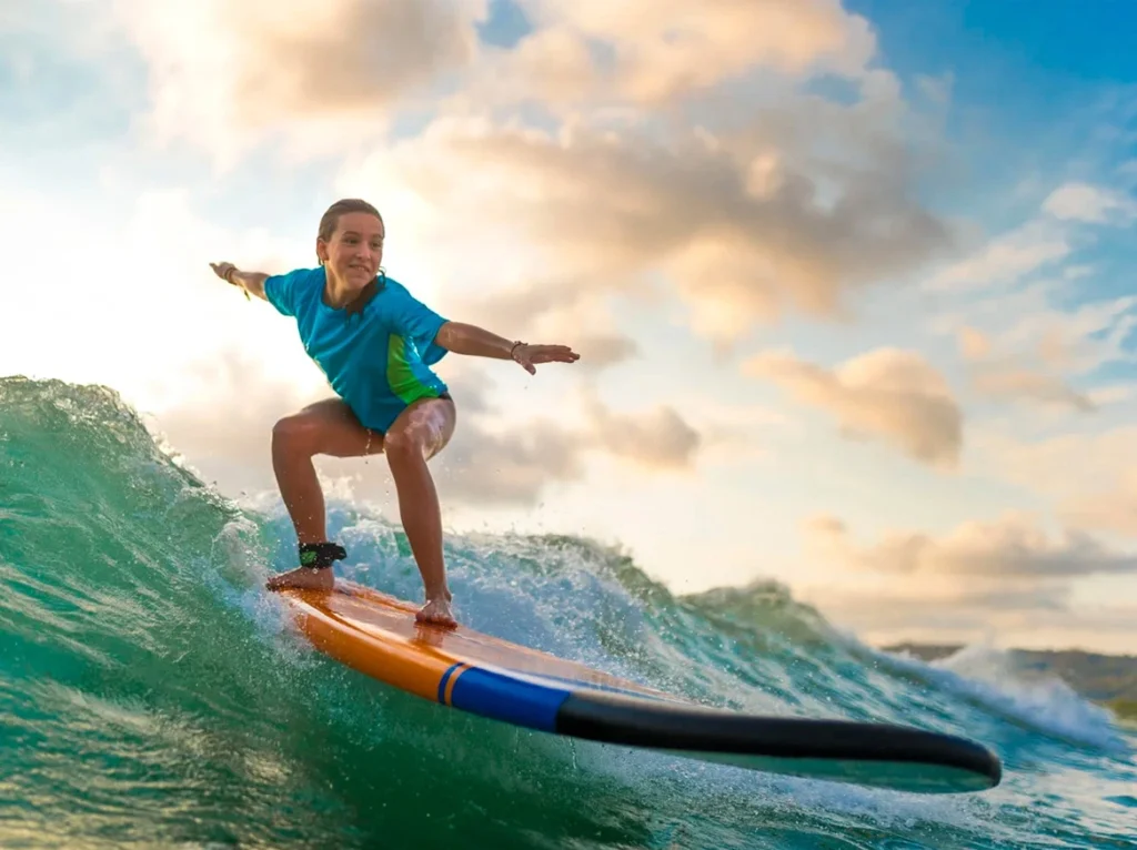 Surf Term middle school student surfing in Costa Rica.